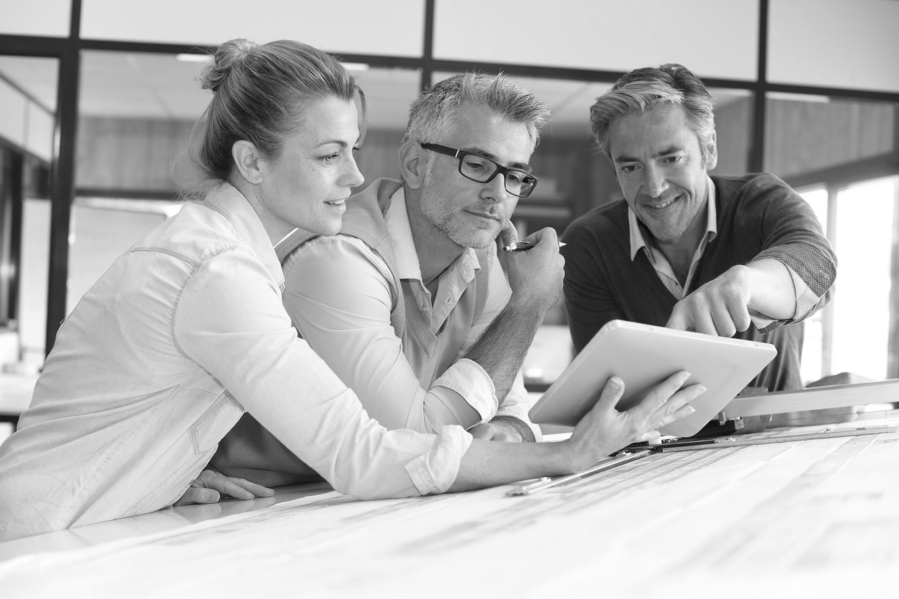 Team of engineers working together on project